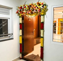 house warming services Traditional 2BHK Door Flower Decoration​