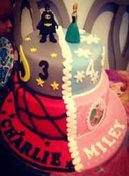 Half Disney princesses and half superheroes cake 