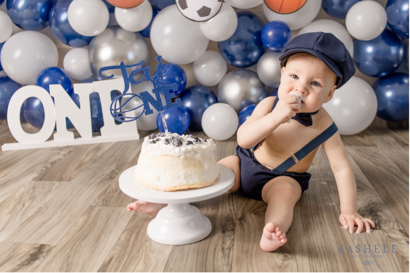 Boys smashing cake